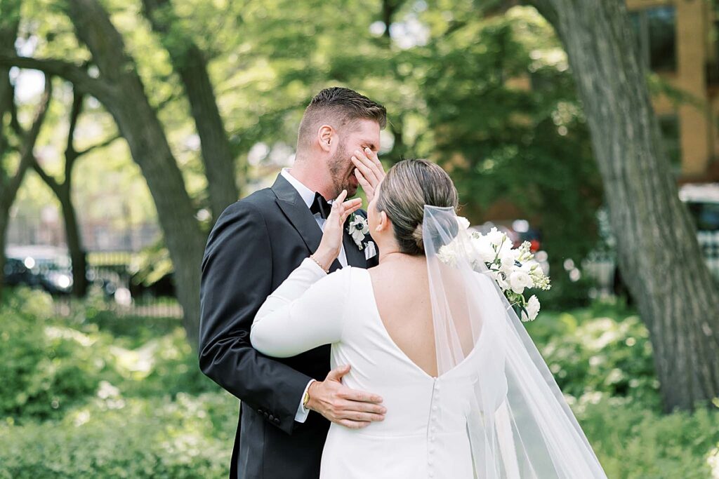 Groom crying on wedding day in Chicago, IL