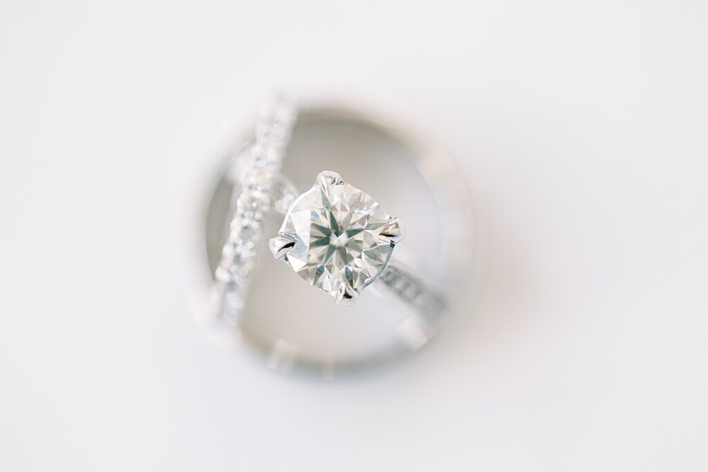 Up close, top down picture of wedding rings on white background