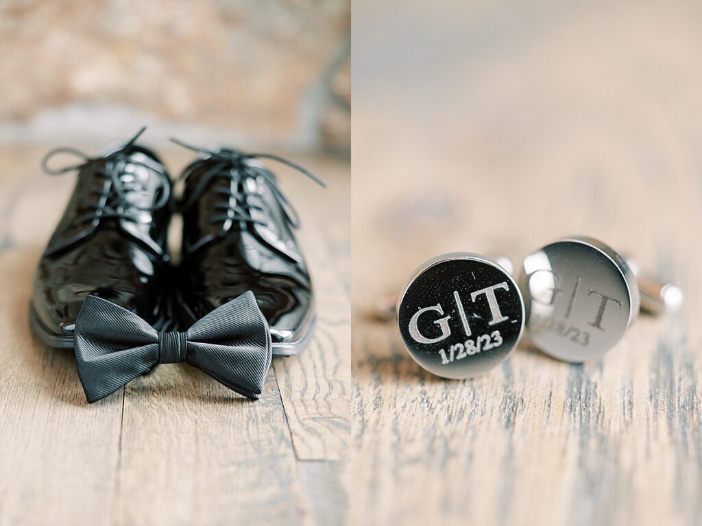 Groom black bowtie, shoes and cufflinks on wood floor