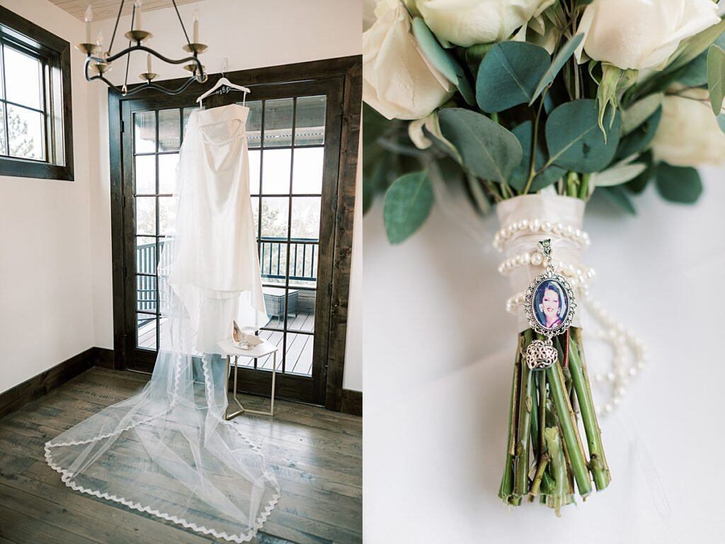 Wedding dress hanging on door and locket on wedding boquet