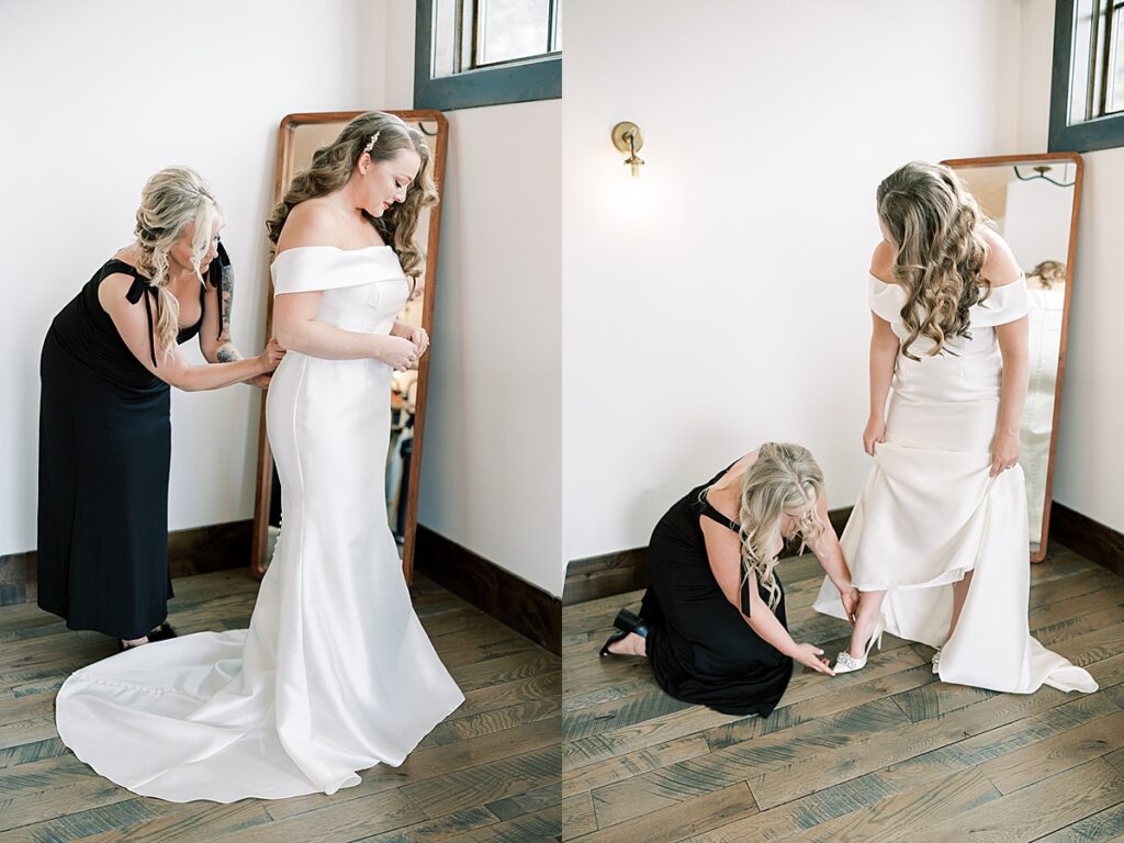 Bridesmaid helps a bride into her shoes