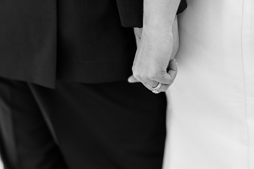 Close up of couple holding hands