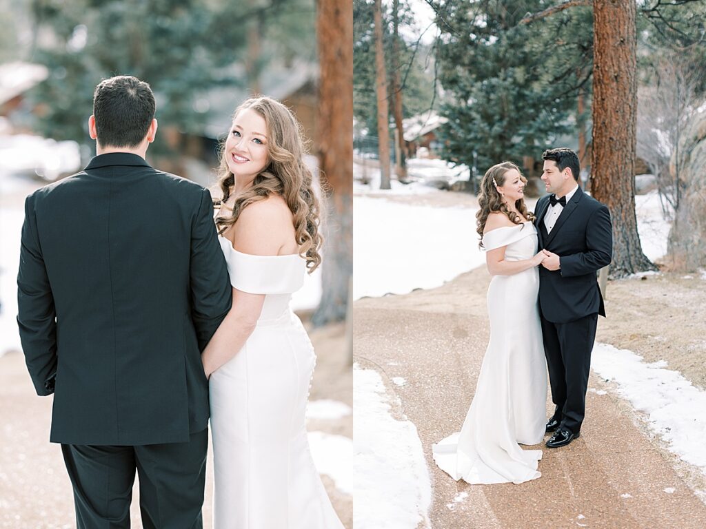 Couple posing for wedding pictures in the snow