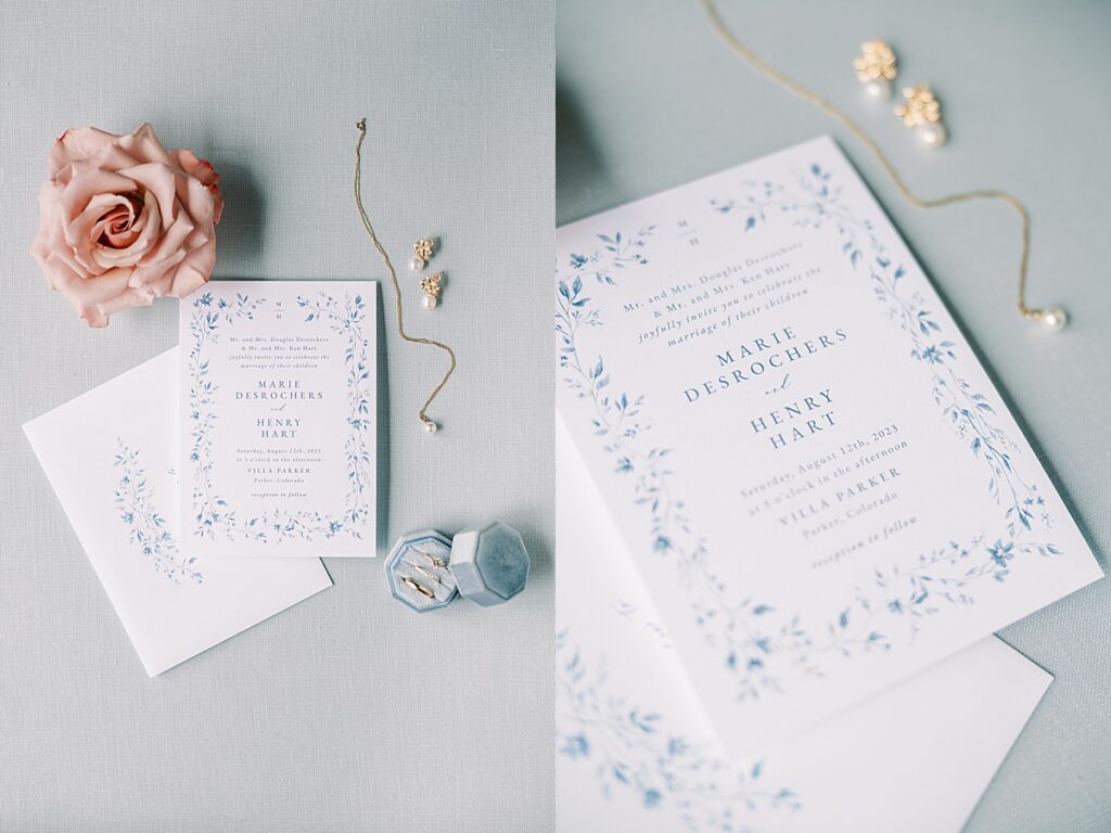 White and blue wedding invitation suite with pink flower