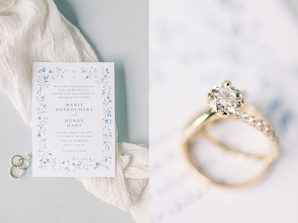 White and blue invitation suite on top of white cheesecloth