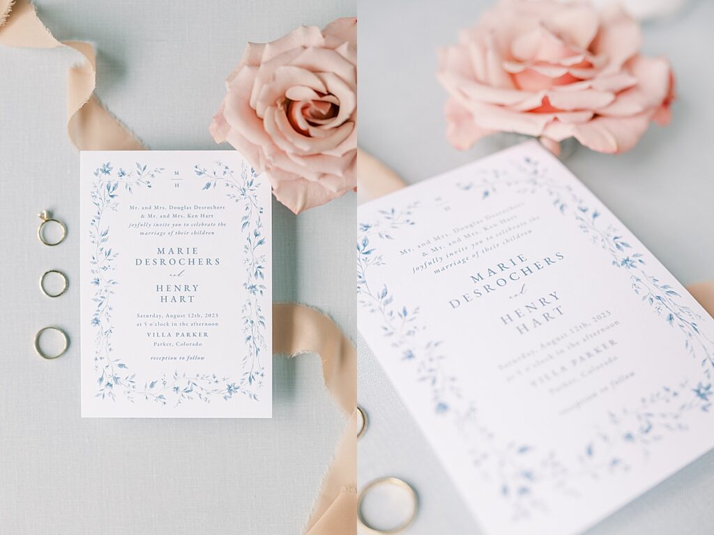 Wedding invitation laid flat with three rings to the left