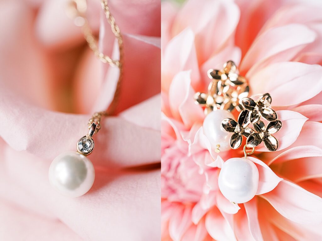 Close picture of pearl wedding earrings and rings on pink flower