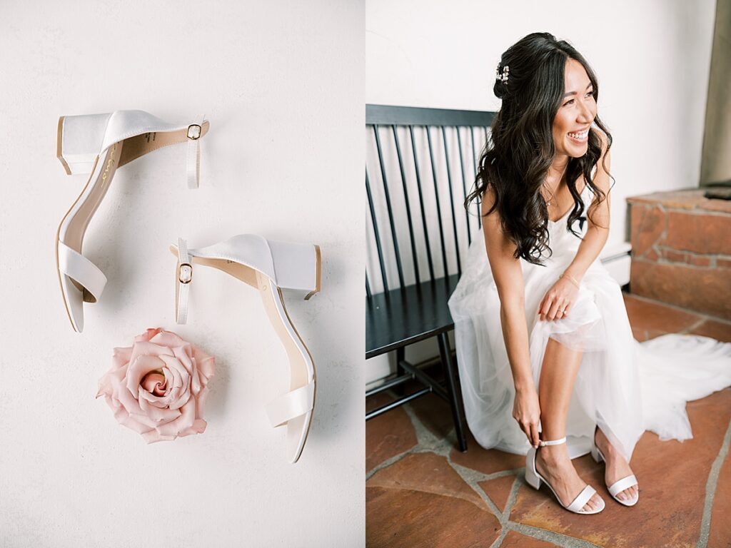 White wedding shoes laying flat with a pink flower