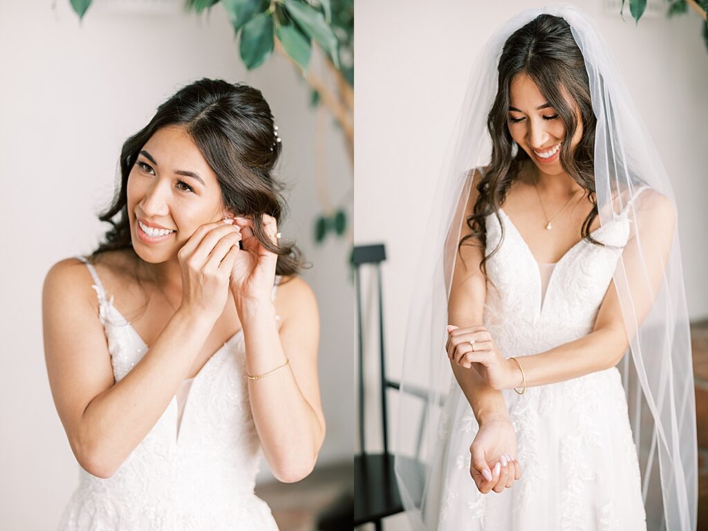 Bride in veil and white dress rubbing perfume on wrists