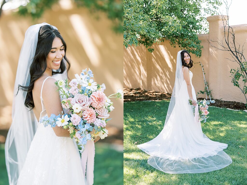 Bride facing away from camera with veil tossed behind her for portarit