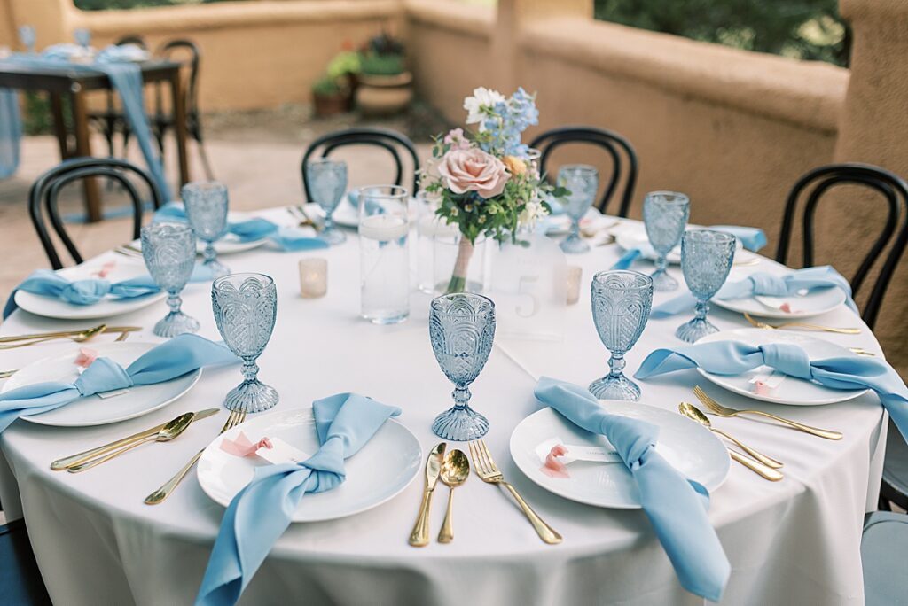 Wedding table with blue place settings