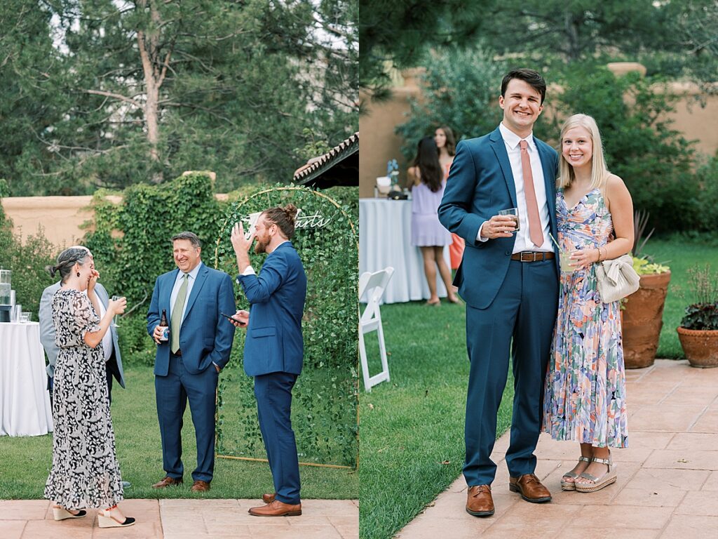 Wedding guests standing in the grass at cocktail hour