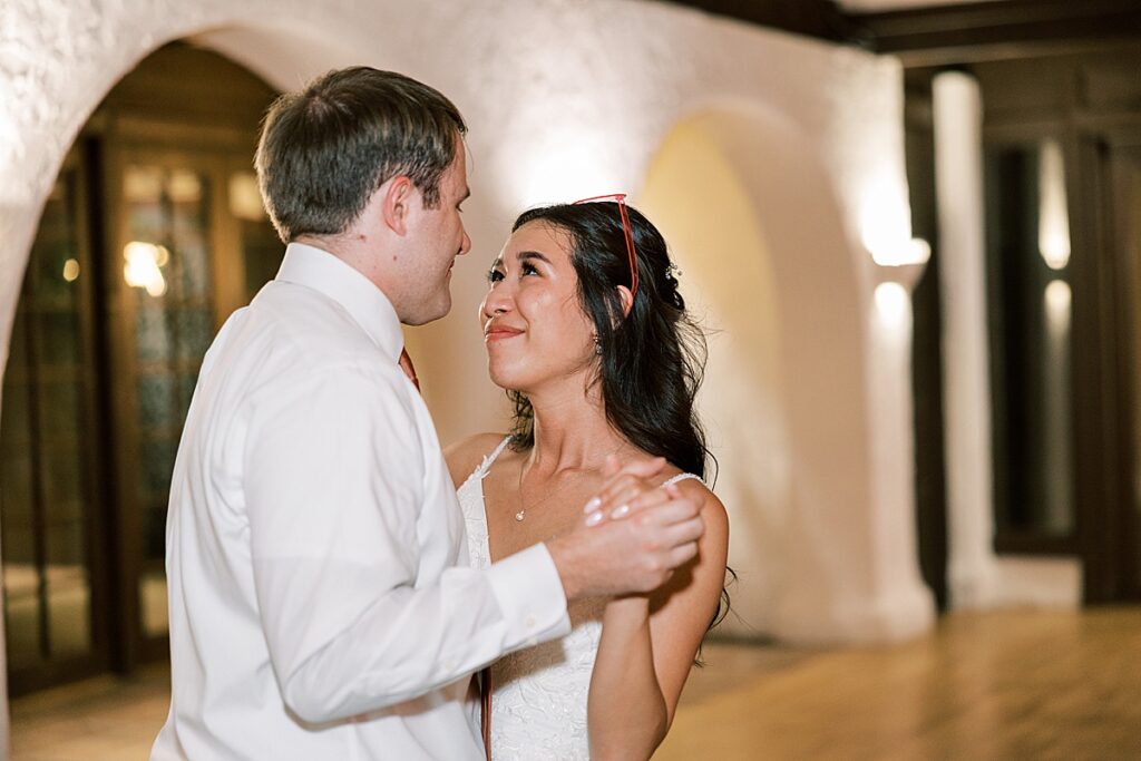 Bride looking up at groom 