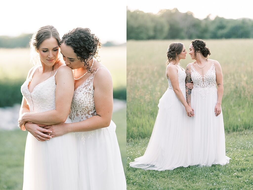 Bride standing back to back while kissing shoulder