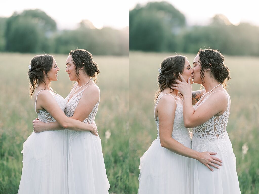 Bride holding bride on face and kissing her